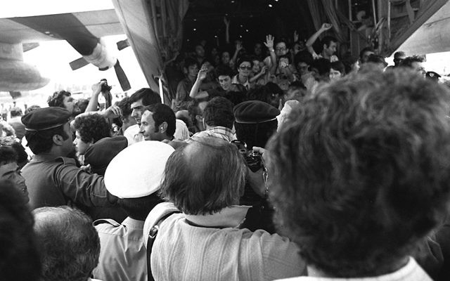 The rescued hostages are welcomed at Ben Gurion Airport.