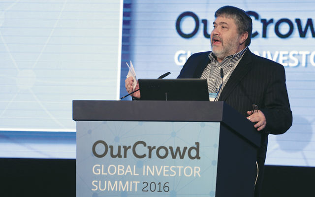Jonathan Medved, founder and CEO of OurCrowd, speaks at the investor summit. (Courtesy OurCrowd)