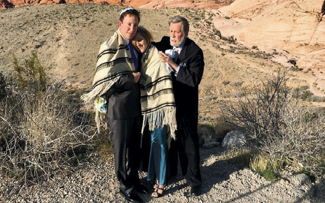 Rabbi Mel Hecht marries Craig Silver and Karen Butt of Connecticut at Red Rock Canyon near Las Vegas on February 12.