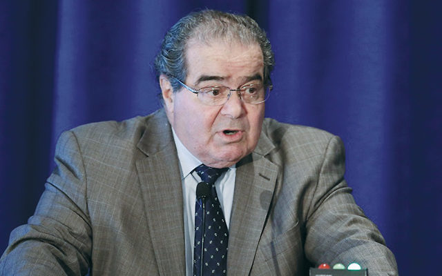 Supreme Court Justice Antonin Scalia addresses the Legal Services Corp.’s 40th anniversary conference luncheon in Washington, D.C., on September 15, 2014. (Chip Somodevilla/Getty Images)