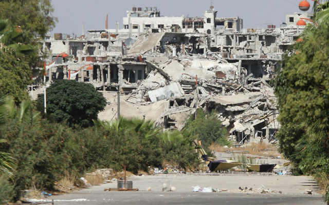 A residential area in Syria that was destroyed by bombing. (Oolodymyr Borodin/ www.shutterstock.com)