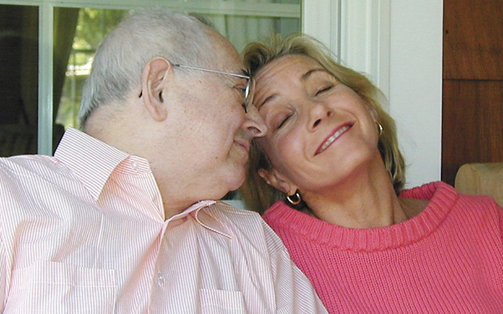 Cantor Kurt Silberman and his daughter, Judy Freilich, laughed together at Ms. Freilich’s Englewood home a few years ago. (COURTESY ARY FREILICH)