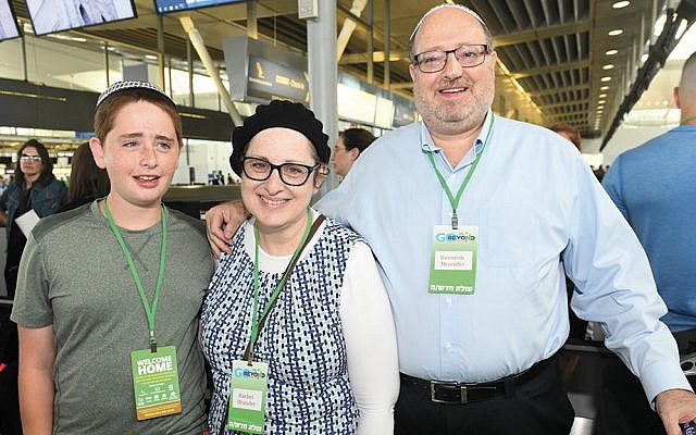 At the airport, Rabbi Kenneth, Ruchie, and Yitzchak Brander are ready to board Nefesh B’Nefesh’s flight to Israel. (Nefesh B'Nefesh)