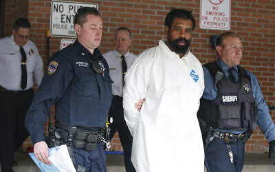 Suspect in Hanukkah celebration stabbings Thomas Grafton, 37 years old from Greenwood Lake, leaves the Ramapo Town Hall in Airmont, New York after being arrested on December 29, 2019.(Kena Betancur / AFP)
