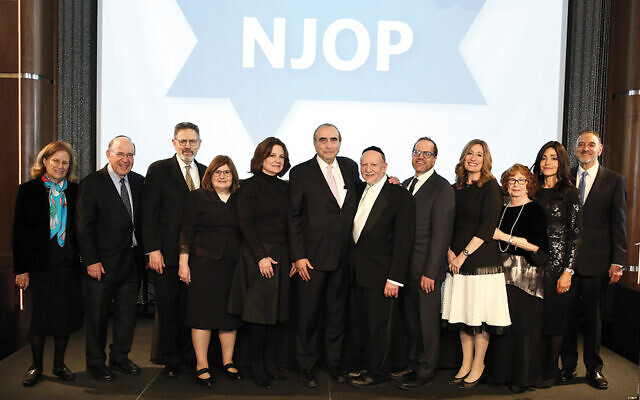 Among the celebrants, pictured from left, were Diane and the Honorable Robert Abrams, Robert and Dr. Susan Chambré, Felise and Hillel Gross, NJOP founder and director Rabbi Ephraim Z. Buchwald, Dr. Gabriel and Anat Levi, Helga Weisburger, and Yona and Dr. Steven Lazar. (Courtesy NJOP)