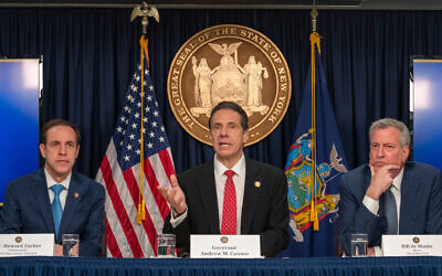 NEW YORK, NY - MARCH 2: New York state Gov. Andrew Cuomo (C), New York City Mayor Bill DeBlasio (R) and New York state Department of Health Commissioner Howard Zucker hold a news conference on the first confirmed case of COVID-19 in New York on March 2, 2020 in New York City. A female health worker in her 30s who had traveled in Iran contracted the virus and is now isolated at home with symptoms of COVID-19, but is not in serious condition. Cuomo said in a statement that the patient "has been in a controlled situation since arriving to New York."  (Photo by David Dee Delgado/Getty Images)