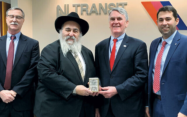 Bris Avrohom gives NJTransit a gift on behalf of local travelers The