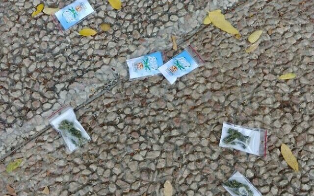 Bags of marijuana litter the street in Tel Aviv. (Israel Police)