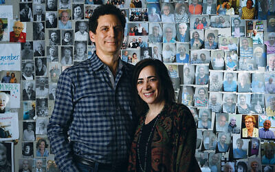 John and Amy Pregulman stand in front of a wall of John’s photos of Holocaust survivors; four of those surviviors — none of whom get help from Kavod — are below. The Pregulmans prefer not to provide survivors’ names.