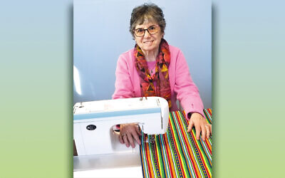 Belle Schwartz and her sewing machine.