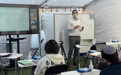 Shalhevet High School in Los Angeles invested in remote learning technology during the pandemic. In the fall, students located in Arizona will begin to attend Shalhevet classes via video. (Tushar Dwivedi)