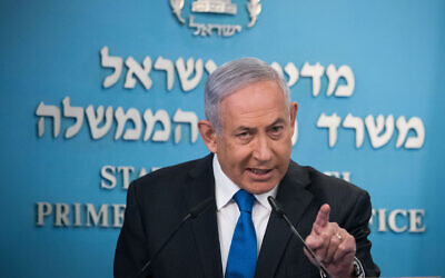 Israeli Prime Minister Benjamin Netanyahu speaks to the media in Jerusalem, Aug. 13, 2020. (Yonatan Sindel/Flash90)
