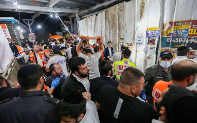 Israeli rescue forces and police at a mass fatality scene, after a stampede in a packed walkway, during celebrations of the holiday of Lag B'Omer on Mt. Meron, in northern Israel on April 30, 2021. (David Cohen/Flash90)
