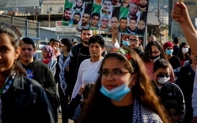 Israeli Arabs participate in a protest in March 2021. (Jamal Awad/Flash90)