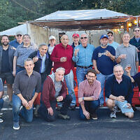 The Glen Rock Jewish Center Men’s Club held its annual “Steak and Scotch in the Sukkah” dinner. The group toasted the new year with single malt scotch and a steak dinner in the sukkah. (Courtesy GRJC)