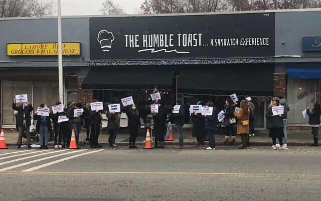 Advocates for victims of sexual abuse rallied in front of the Humble Toast in Teaneck on Sunday.