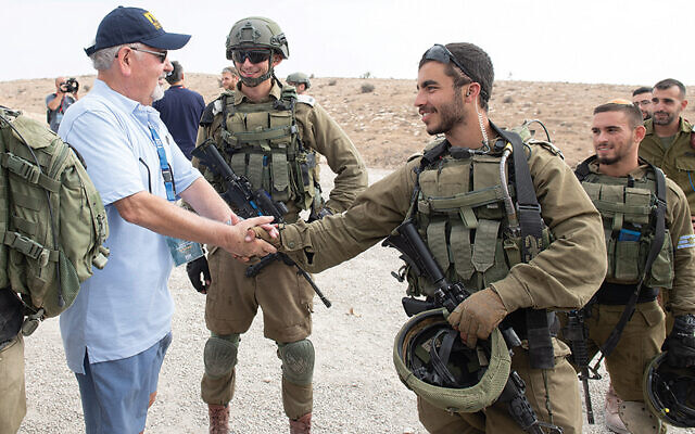 Jacob Klein with IDF paratroopers. (Sraya Diamant, courtesy of FIDF.)