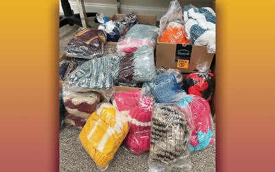 Some of the many knitted items donated by Tink to JFCS. (Courtesy JFCSNNJ)