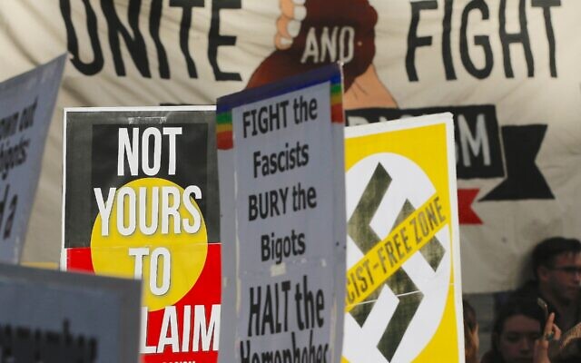 Signs at an anti-racist rally organized to counter a march held by far-right patriot groups in Melbourne, Australia, June 25, 2017. (Photo by Darrian Traynor/Getty Images)
