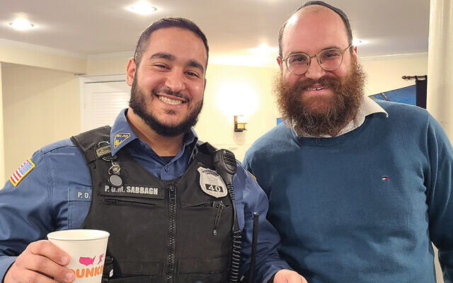 Police officer Matthew Sabbagh and Rabbi Yosef Orenstein (Valley Chabad CTeen)