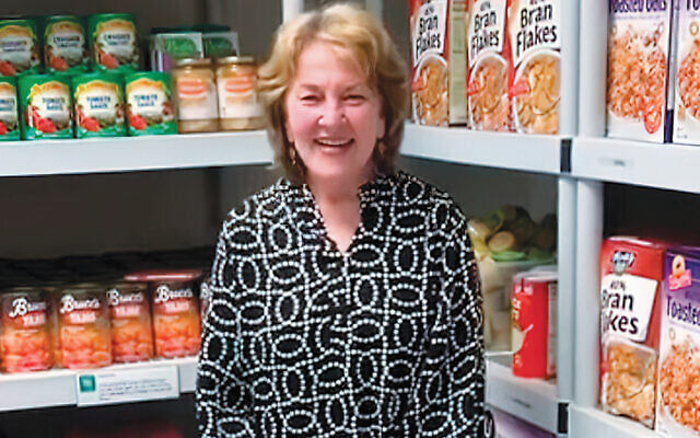 Susan Greenbaum in the JFCS food pantry, the Corner Market.