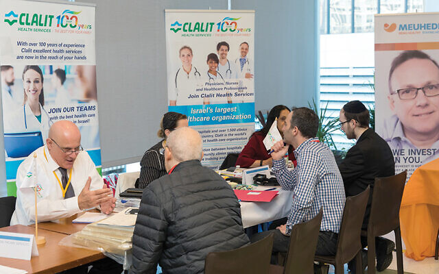 American medical professionals meet with Israeli HMO recruiters at the 2019 Aliyah MedEx. (Jenna Bascom)