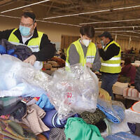 At an abandoned mall in Przemysl, Poland, near the border with Ukraine, which now in being used as a refugee aid center, volunteers are organizing blankets. (Courtesy Jodi Scherl) At an abandoned mall in Przemysl, Poland, near the border with Ukraine, which now in being used as a refugee aid center, volunteers are organizing blankets. (Courtesy Jodi Scherl)