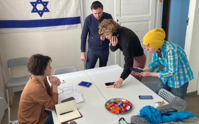 Volunteers work together at a Jewish community crisis center in Warsaw. (Toby Axelrod) Volunteers work together at a Jewish community crisis center in Warsaw. (Toby Axelrod)