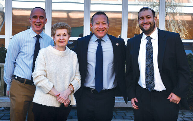 Rep. Josh Gottheimer (D-NJ 5), third from left, is at the Solomon Schechter Day School of Bergen County in New Milford with its head of school, Steve Freeman; Ricky Stamler-Goldberg, its director of education and Judaic studies; and Rabbi Efrem Reis, the school’s rabbi.