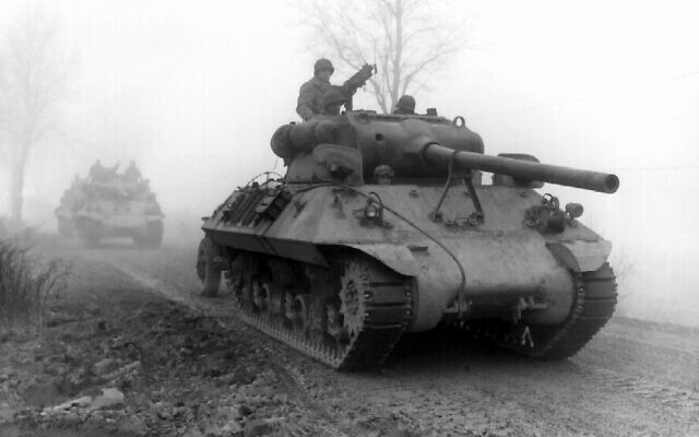M3 90mm gun-armed American M36 tank destroyers of the 703rd TD, attached to the 82nd Airborne Division, move forward during heavy fog to stem German spearhead near Werbomont, Belgium, on December 20, 1944. (Wikipedia)