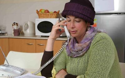 In a 2009 photo, A yoetzet halachah, or Jewish legal counselor, answers a hotline for women with questions relating to Jewish laws on sex and intimacy. (Courtesy Nishmat)