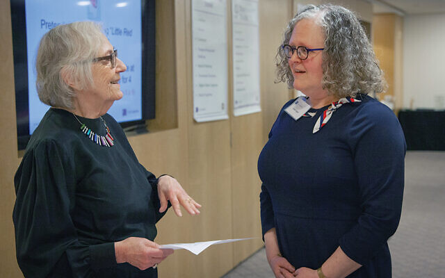 Tamar Appel, right, talks with Claire Wurtzel, the co-educational director of Hidden Sparks, at a Learning Lenses meeting.
