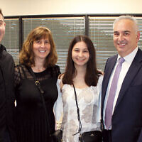 Daniel M. Shlufman, right, with his wife, Sari, their daughter, Dina, and their son, Noah.