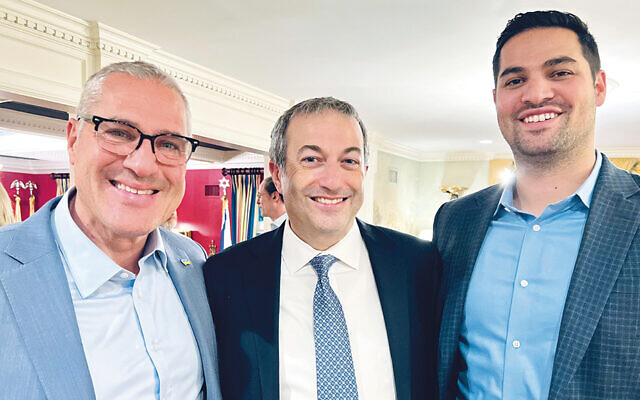 Englewood Mayor Michael Wildes, left, who graduated from YU’s Cardoza School of Law in 1989 and has been an adjunct professor there for the past 12 years, stands with YU’s president Rabbi Dr. Ari Berman, and his son Josh Wildes (Yeshiva University Sy Syms/JSS ’16, and Cardoza ’19.)