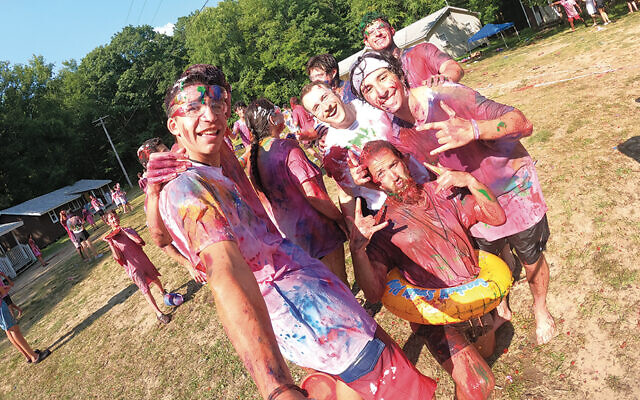 Staffers get into the spirit of Messy Day at Cedar Lake Camp last summer. (New Jersey Y Camps)