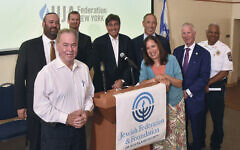 Jewish community leaders and Rockland County officials announcing the security initiative. (L to R) Jewish Federation & Foundation of Rockland County CEO Ari Rosenblum; County Executive Ed Day; Rockland Security Initiative director Ethan Erlich; UJA Federation of New York President and CEO Eric Goldstein; Jewish Community Relations Council New York Community Security Initiative Executive Director Mitch Silber; Jewish Federation & Foundation of Rockland County Board Co-President Marcy Pressman; District Attorney Tom Walsh, and Sheriff’s Captain Tony DeColyse.