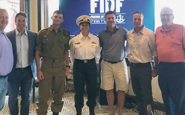 Wayne Kent, left, with Rob Fink, Staff Sergeant Rom of Demarest, Captain Ofir, Mitch Broder, Major General Nadav Padan, and Howard Gases (Courtesy of FIDF)