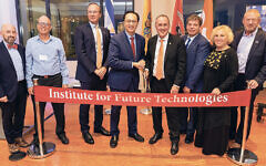 From left, Kenneth Alexo, vice president of development and alumni relations at New Jersey Institute of Technology; Baruch Schieber, director of the Institute for Future Technologies; Craig Gotsman, dean of NJIT’s Ying Wu College of Computing; NJIT President Teik C. Lim; BGU President Daniel Chamovitz; BGU Rector Chaim Hames; BGU vice president of global engagement Limor Aharonson-Daniel; and Americans for BGU CEO Doug Seserman.