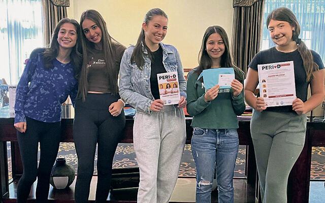 Local BBYO members assembled packages for JFNNJ’s Period Poverty —  Change the Cycle! program. From left, they are Abigail Kushman, Adina F., Stevie Schonberg, Dina Shlufman, and Sophie Conen. (All photos courtesy JFNNJ)
