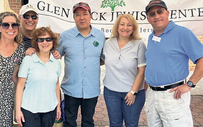 Michelle Strassberg, GRJC’s director of operations, is with with Paul and Shelia Toffell, GRJC Men’s Club president Bill Newberry, Ellen Rosenwald, and Bruce Nirenberg. (Courtesy GRJC)