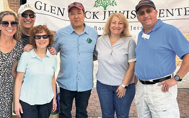 Michelle Strassberg, GRJC’s director of operations, is with with Paul and Shelia Toffell, GRJC Men’s Club president Bill Newberry, Ellen Rosenwald, and Bruce Nirenberg. (Courtesy GRJC)