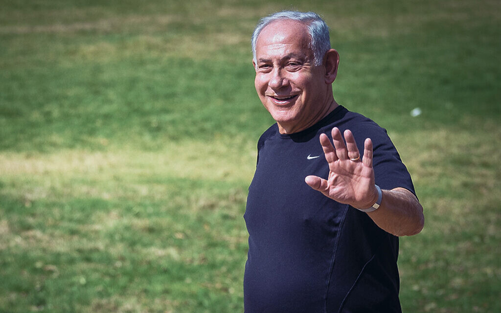 Benjamin Netanyahu looks happy the morning after the Israeli general elections, Nov. 2, 2022. Yonatan Sindel/Flash90)