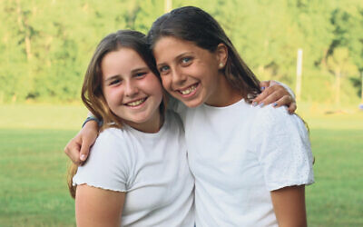 Nili Rothenberg, left, and Abby Herman are working together on their bat mitzvah project.