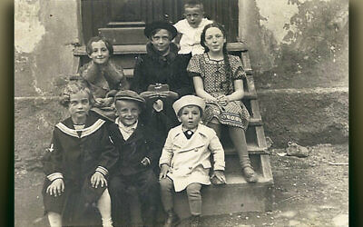 Nelly Gutman, one of the few survivors from Pacov, is on the right, in the middle row. The photo was taken in Pacov in 1937. (Photos courtesy FLJC/CBI)