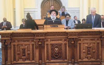 Rabbi Mordechai Kanelsky gives the invocation