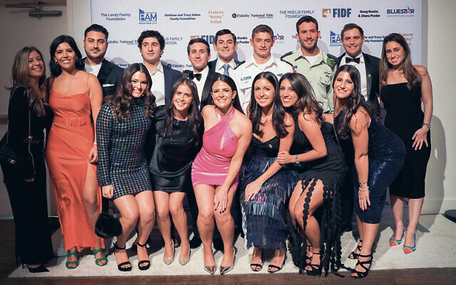 Top row from left, Talia Gutkin, Davina Farahi, Hunter Janoff of Livingston, Zev Rand of Teaneck, Scott Matza, Laurence Kruglyak of Wayne, Captain Nimrod, Lieutenant Ari, gala co-chair Josh Lunder, and Mindy Pasternack. Madison Wallach, Mollie Falk, gala co-chairs Lauren Bronstein and Colby Berman, Amy Nazar, and Maya Billig are in the front.