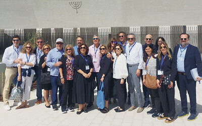 The group from Temple Emanu-El of Closter stands outside the Moses Ben Maimon Synagogue in Abu Dhabi’s new Abrahamic Center.