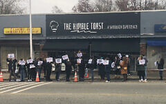 Advocates for victims of sexual abuse rallly in front of the Humble Toast in Teaneck in November, 2021.