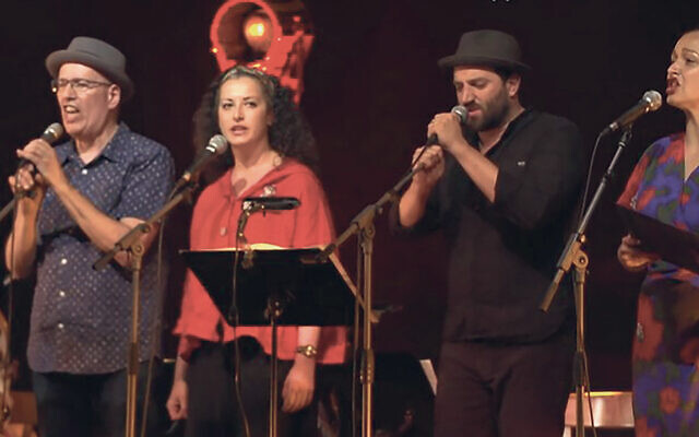 From left, Josh Waletzky, Sveta Kundish, Daniel Kahn, and Sasha Lurje sing together in 2019.