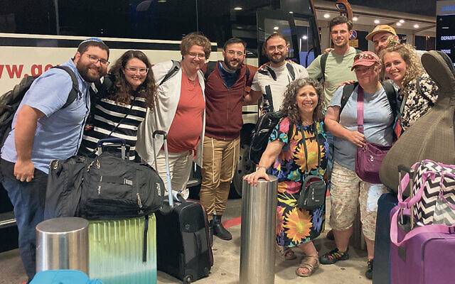 Some of the fellowship members say goodbye as they get ready for their flight back home. (All photos Courtesy Lise Stern)